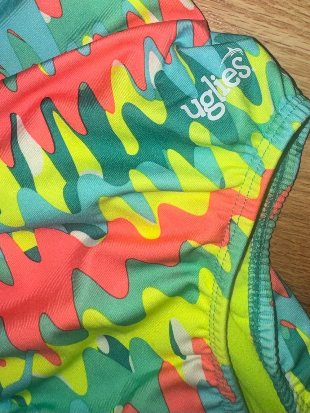 Dolfin Uglies V-Back swimsuit in the  Zippy print, size 36  EUC